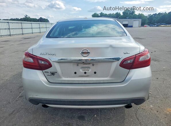 1N4AL3AP7JC216457 2018 NISSAN ALTIMA Silver Rear view