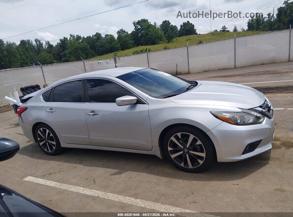 1N4AL3AP8GN390499 2016 NISSAN ALTIMA Серебряный Вид задней части салона