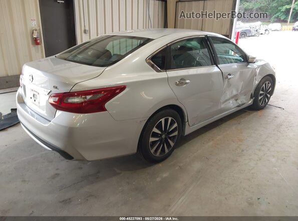 1N4AL3AP9JC179329 2018 NISSAN ALTIMA Серебряный Задняя правая четверть