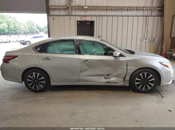 1N4AL3AP9JC179329 2018 NISSAN ALTIMA Серебряный Вид задней части салона