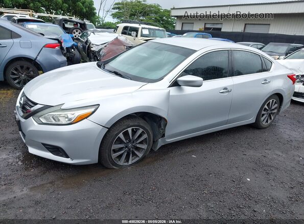 1N4AL3APXGC197878 2016 NISSAN ALTIMA Silver Vista tres cuartos delantera izquierda