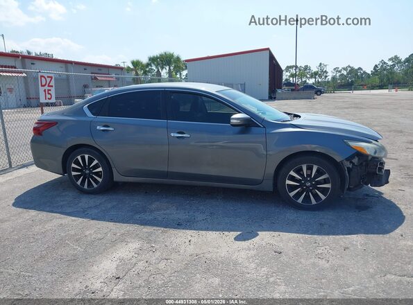 1N4AL3APXJC228506 2018 NISSAN ALTIMA Gray Widok wnętrza z tyłu