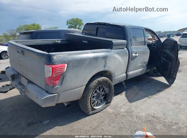 1N6BA1F42GN514934 2016 NISSAN TITAN XD Black Trasero derecho