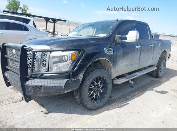 1N6BA1F42GN514934 2016 NISSAN TITAN XD Black Vista tres cuartos delantera izquierda
