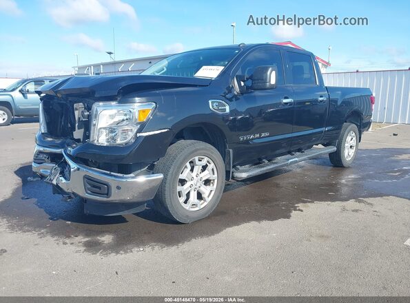 1N6BA1F4XKN522286 2019 NISSAN TITAN XD Black Առջևի ձախ երեք քառորդ տեսարան