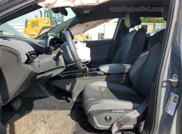 1V25MPE82RC010850 2024 VOLKSWAGEN ID.4 Charcoal Widok wnętrza z przodu