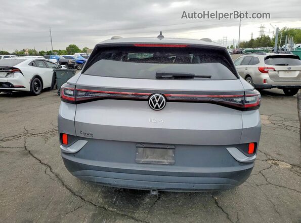 1V2WNPE83PC038476 2023 VOLKSWAGEN ID.4 Серебряный Вид сзади