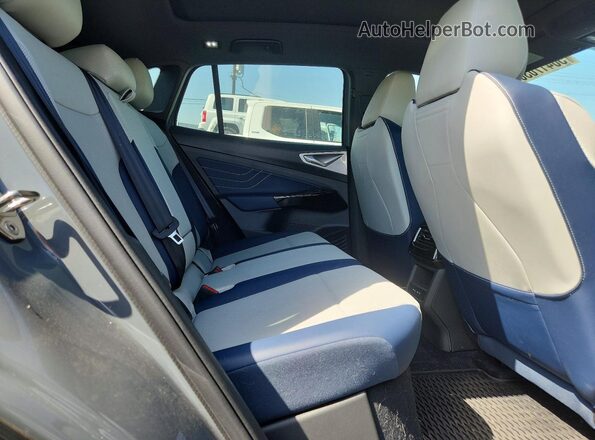 1V2WSPE84SC009974 2025 VOLKSWAGEN ID.4 Gray Widok wnętrza z tyłu