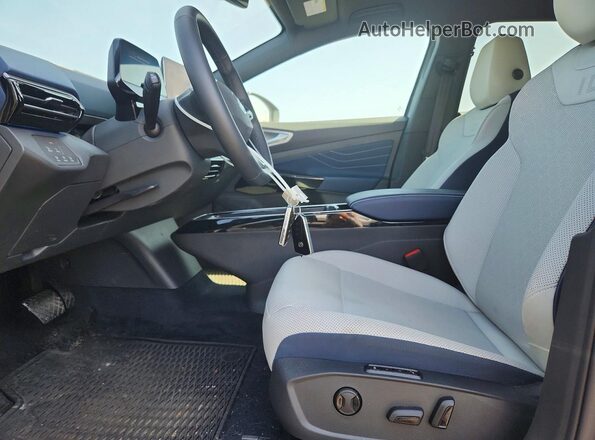 1V2WSPE84SC009974 2025 VOLKSWAGEN ID.4 Gray Widok wnętrza z przodu