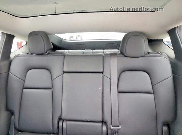7SAYGAEEXPF742736 2023 TESLA MODEL White Rear interior view