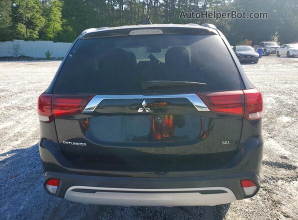 JA4AZ3A38LZ020494 2020 MITSUBISHI OUTLANDER Black Front interior view