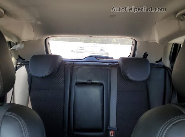 KL4CJASB4MB347799 2021 BUICK ENCORE White Vista interior trasera