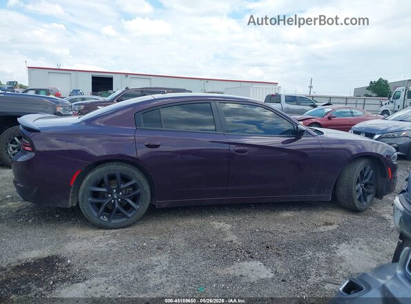 2C3CDXBG5MH512668 2021 DODGE CHARGER Purple Vista interior trasera