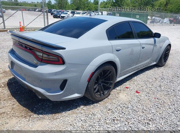 2C3CDXGJ9NH189571 2022 DODGE CHARGER Gray Trasero derecho