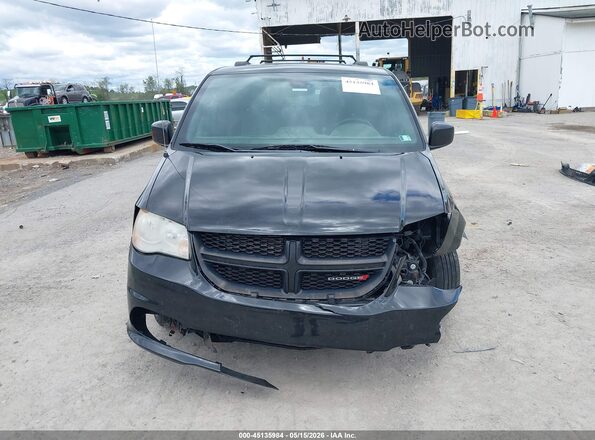 2C4RDGEG3JR299565 2018 DODGE GRAND CARAVAN Black Rear interior view