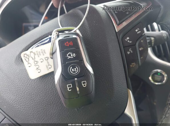 2FMPK3J80HBB10499 2017 FORD EDGE Tan Dashboard view