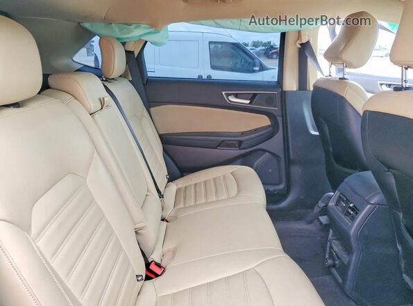 2FMPK3J95LBB59599 2020 FORD EDGE Silver Rear seats view
