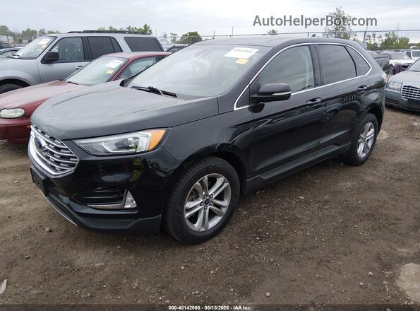 2FMPK3J98KBB24909 2019 FORD EDGE Black Vista tres cuartos delantera izquierda