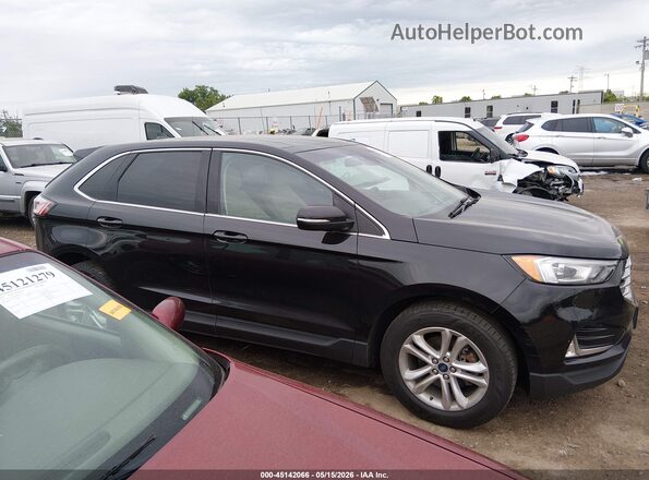 2FMPK3J98KBB24909 2019 FORD EDGE Black Vista interior trasera