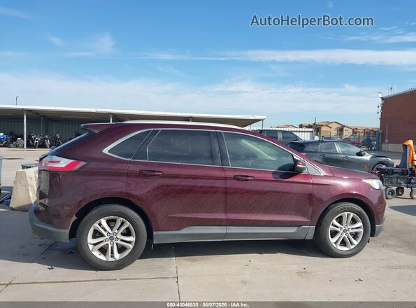2FMPK3J99KBB48992 2019 FORD EDGE Burgundy Rear interior view