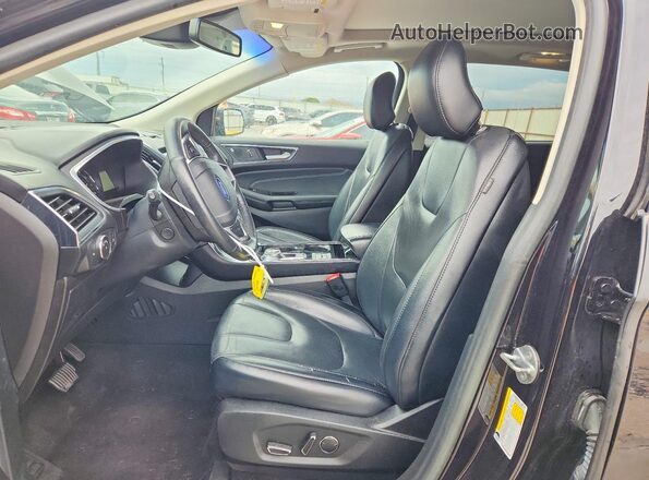 2FMPK3K96KBB89272 2019 FORD EDGE Черный Вид салона спереди