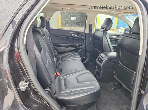 2FMPK3K96KBB89272 2019 FORD EDGE Черный Вид задней части салона