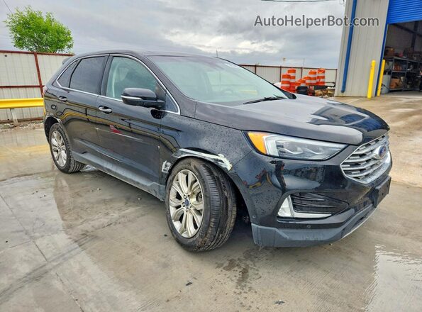 2FMPK3K96KBB89272 2019 FORD EDGE Черный Передняя правая четверть