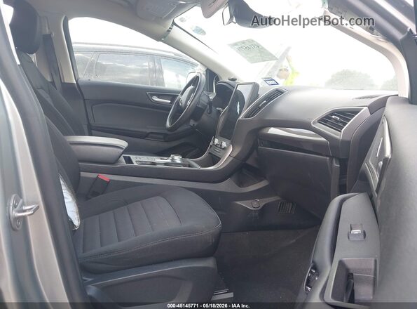 2FMPK4G97NBA70066 2022 FORD EDGE Серебряный Вид салона спереди