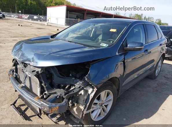 2FMPK4J81JBB49596 2018 FORD EDGE Light Blue Vista tres cuartos delantera izquierda