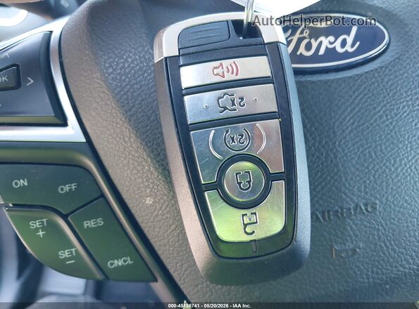 2FMPK4J81JBB70173 2018 FORD EDGE Синий Вид панели приборов