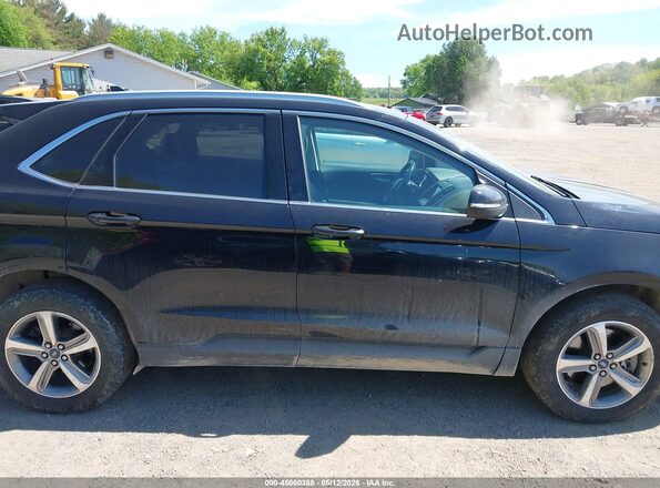 2FMPK4J90KBC05943 2019 FORD EDGE Black Widok wnętrza z tyłu