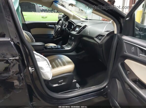 2FMPK4J91KBC48249 2019 FORD EDGE Black Front interior view