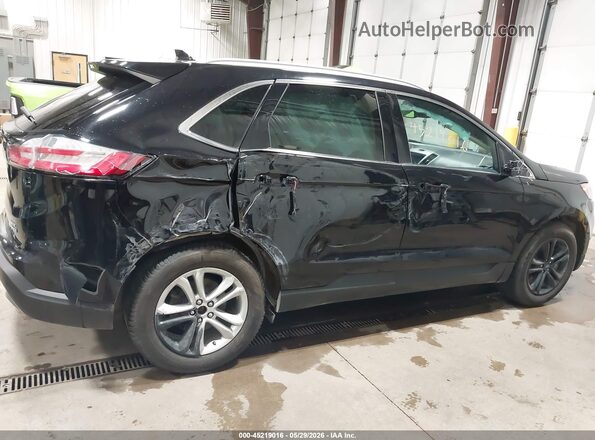 2FMPK4J91KBC48249 2019 FORD EDGE Black Rear interior view