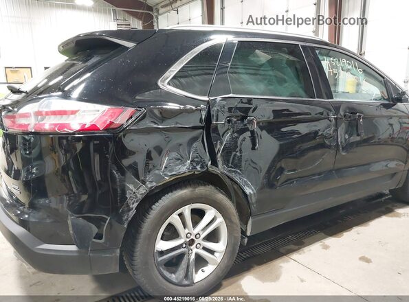 2FMPK4J91KBC48249 2019 FORD EDGE Black Front view