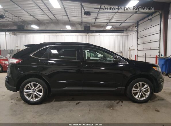 2FMPK4J93JBC12318 2018 FORD EDGE Black Widok wnętrza z tyłu