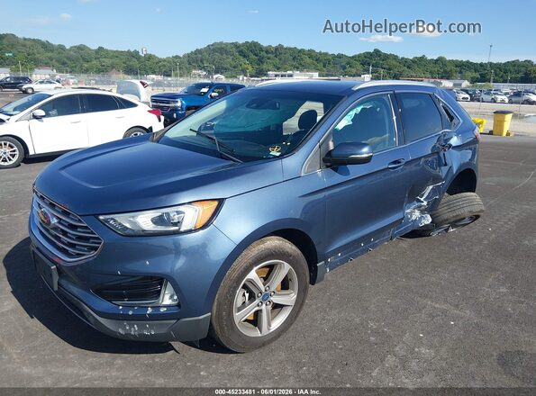 2FMPK4J93KBC06097 2019 FORD EDGE Blue Vista tres cuartos delantera izquierda