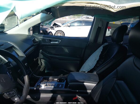 2FMPK4J93KBC06097 2019 FORD EDGE Blue Vista interior delantera
