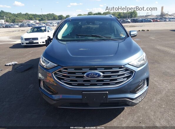 2FMPK4J93KBC06097 2019 FORD EDGE Blue Vista interior trasera