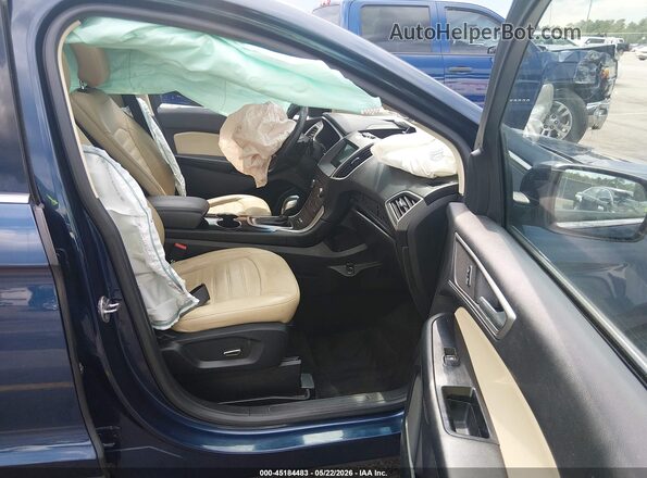 2FMPK4J94HBC39683 2017 FORD EDGE Blue Front interior view