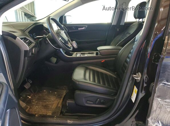 2FMPK4J94RBA97076 2024 FORD EDGE Black Front interior view