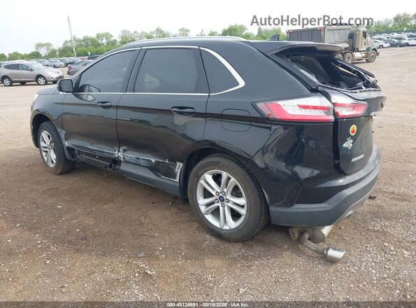 2FMPK4J96KBB86976 2019 FORD EDGE Black Trasero izquierdo