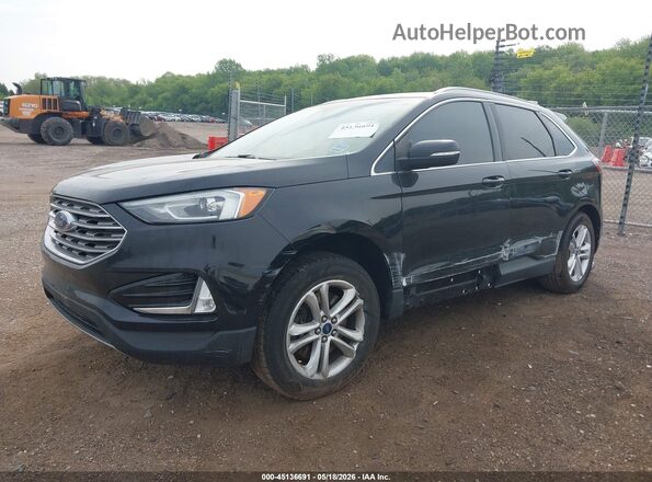 2FMPK4J96KBB86976 2019 FORD EDGE Black Vista tres cuartos delantera izquierda