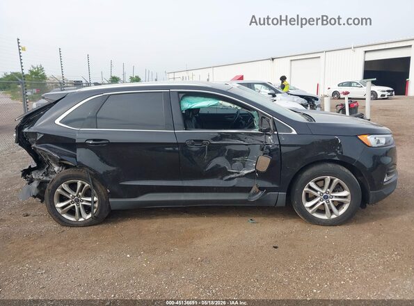 2FMPK4J96KBB86976 2019 FORD EDGE Black Vista interior trasera