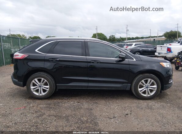2FMPK4J96KBC47792 2019 FORD EDGE Black Widok wnętrza z tyłu
