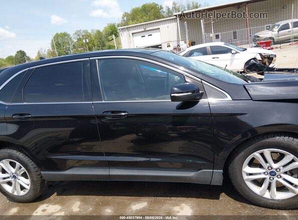 2FMPK4J97KBB48477 2019 FORD EDGE Black Вид задньої частини салону
