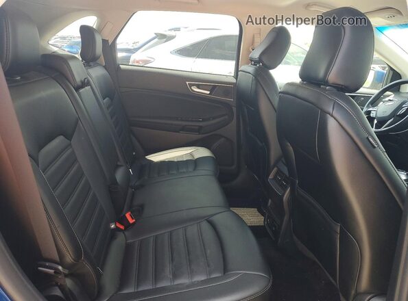 2FMPK4J97LBA19074 2020 FORD EDGE Blue Вид задньої частини салону