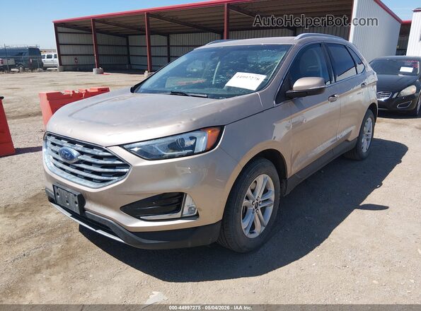 2FMPK4J97LBA49725 2020 FORD EDGE Золотой Передняя левая четверть