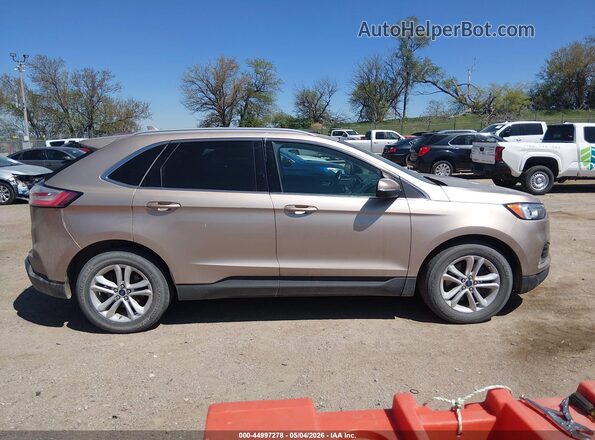 2FMPK4J97LBA49725 2020 FORD EDGE Золотой Вид задней части салона
