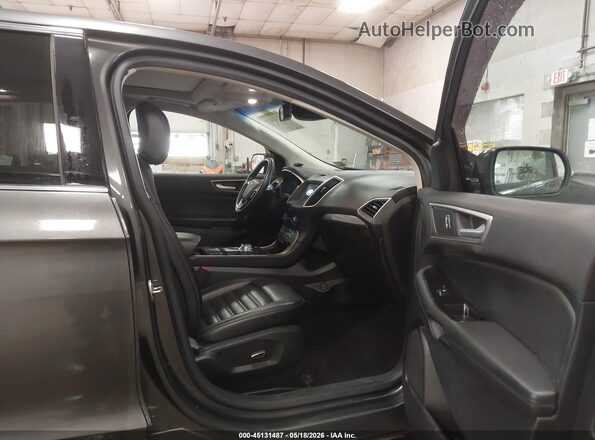 2FMPK4J98KBC42304 2019 FORD EDGE Серый Вид салона спереди