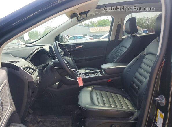 2FMPK4J98PBA12866 2023 FORD EDGE Black Front interior view